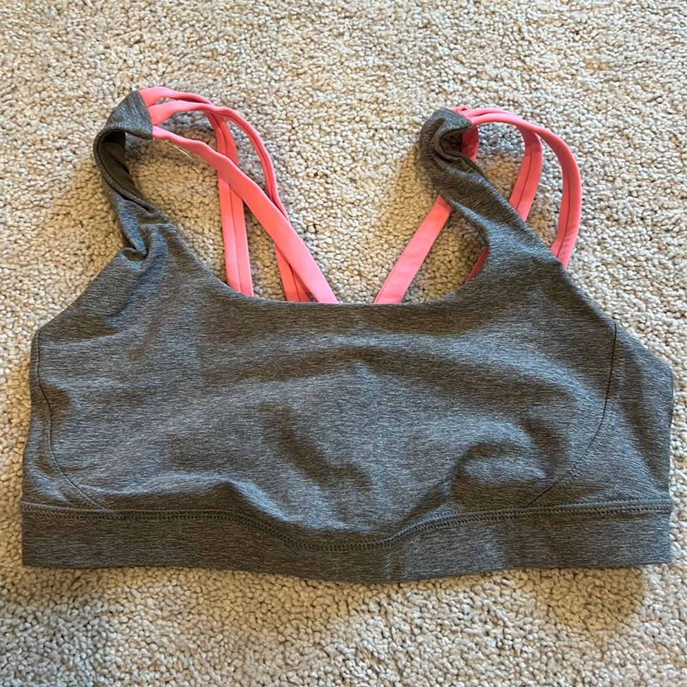 Lululemon grey and pink sports bra. Size 8. Great condition.